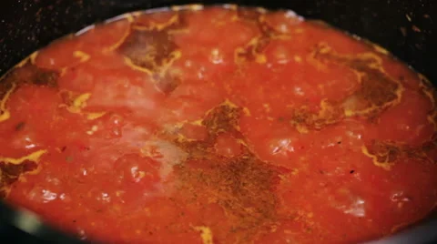 Making of Tomato salsa - tomato boiling with herbs - close up Stock Footage 42821885