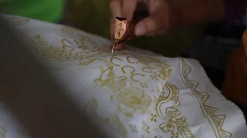 Making traditional Batik with hand dyed at Lasem village, Cental Java, Video stock 217744215