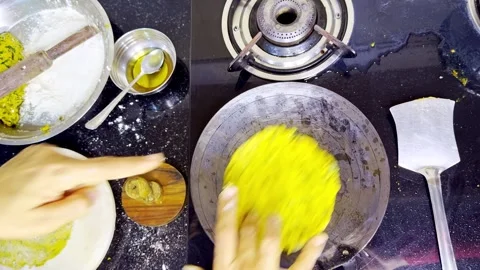 Making Traditional Indian Flatbread on Griddle in Kitchen Stock Footage 311631439