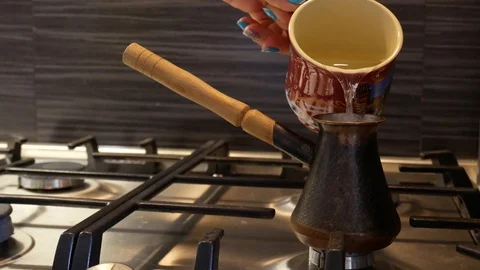 Making turkish coffee in copper cezve Stock Footage 116626751