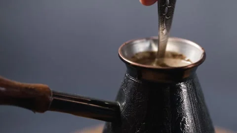 Making Turkish coffee in copper cezve Stock Footage 168572033