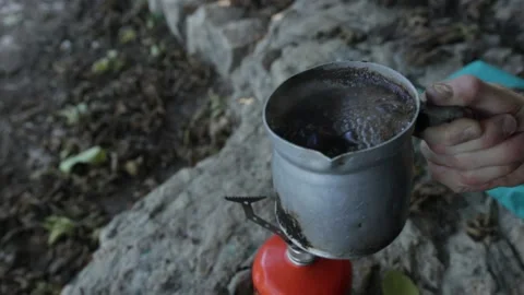 Making Turkish coffee in nature - boiling coffee in forest FHD Video stock 155197707