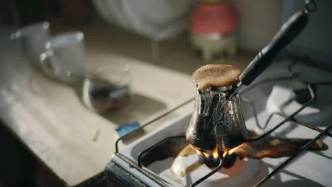Making turkish coffee. Running coffee. Slow Motion. 4K. Video stock 107185213