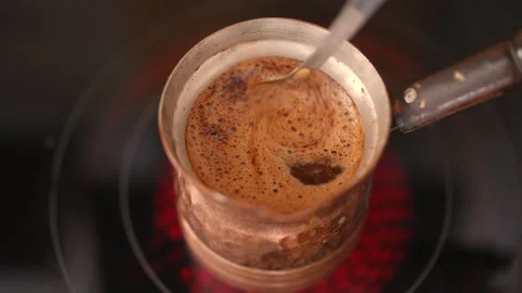 Making Turkish style coffee cezve, top view Stock Footage 310195889