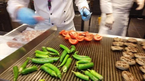 Making Turkish Tavuk step 2 grilling tomatoes 스톡 동영상 108500769
