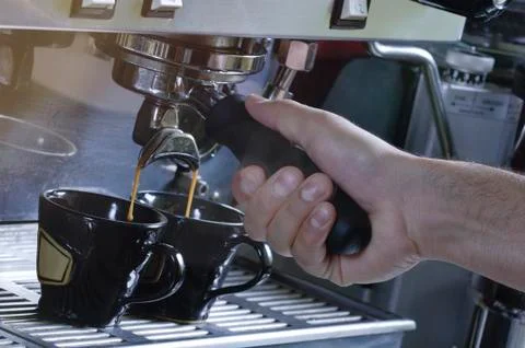 Making two cups of espresso on a machine Foto stock