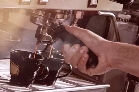 Making two cups of espresso on a machine Foto stock