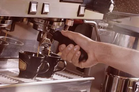 Making two cups of espresso on a machine Stock Photos