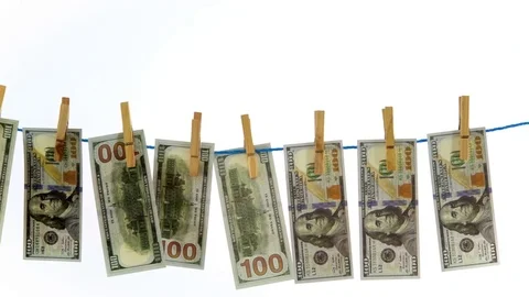 Making USD Dollar Money Laundry in White Background Studio Stock Footage 76514756