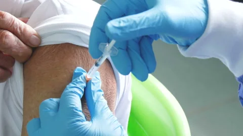 Making vaccination to elderly patient. closeup view. Stock Footage 166432566
