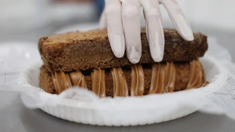 Making Vanilla and Cinnamon Cake with Dulce de Leche Filling Stock Footage 128819837