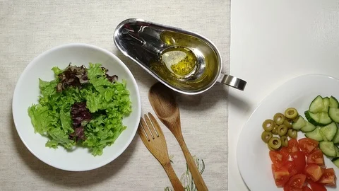 Making vegetarian salad top view adding ingredients Stock Footage 103107974
