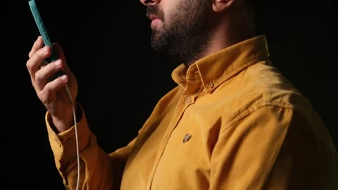 Making a Video Call While Phone Is Charging — Close-Up Shot Stock Footage 318163076