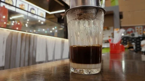 Making Vietnamese coffee close-up Stock Footage 127856018