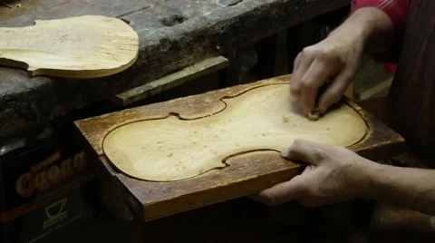 Making of violin, scraping in mold Stock-Footage 47747297