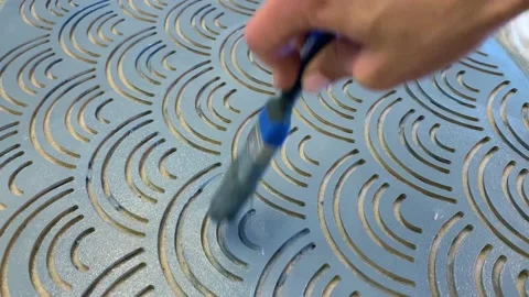 Making wall decoration with wave pattern Stock Footage 197328905