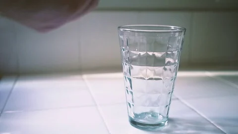 Making Whiskey On the Rocks Slow Motion Montage Stock Footage 77454714