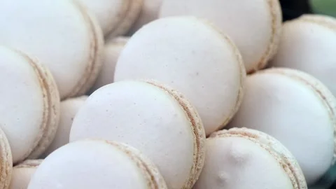 Making white macarons in a busy kitchen Stock Footage 339755798