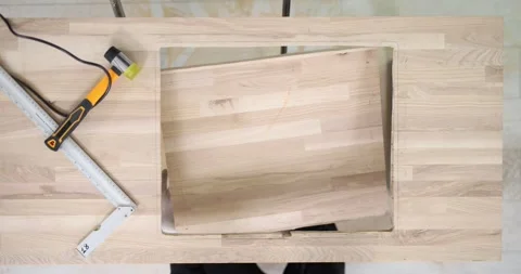 Making wooden table and cutting a hole for sink Stock Footage 274475155