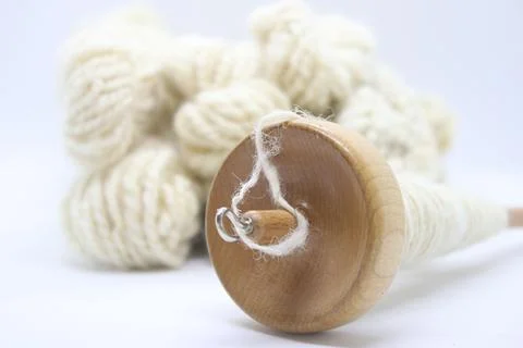 Making wool with a spindle Stock Photos