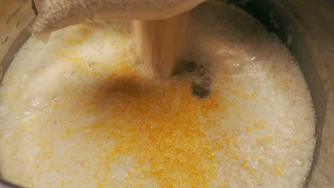 For making wort of corn home-made moonshine in a brewing kettle Stock Footage 130379251