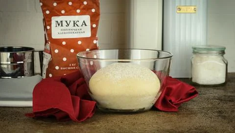 Making yeast dough for baking bread, ingredients and kitchen utensils in the Stock Photos