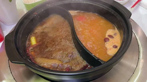 Mala soup is in a hot pot Stock Footage 283889056