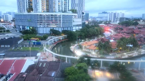 Malacca river flowing to ocean in Malaysian UNESCO city Melaka at sunrise 4k. Stock Footage 288578326