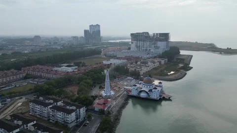Malacca Straits Mosque appears to float from an aerial angle. 스톡 동영상 315546885