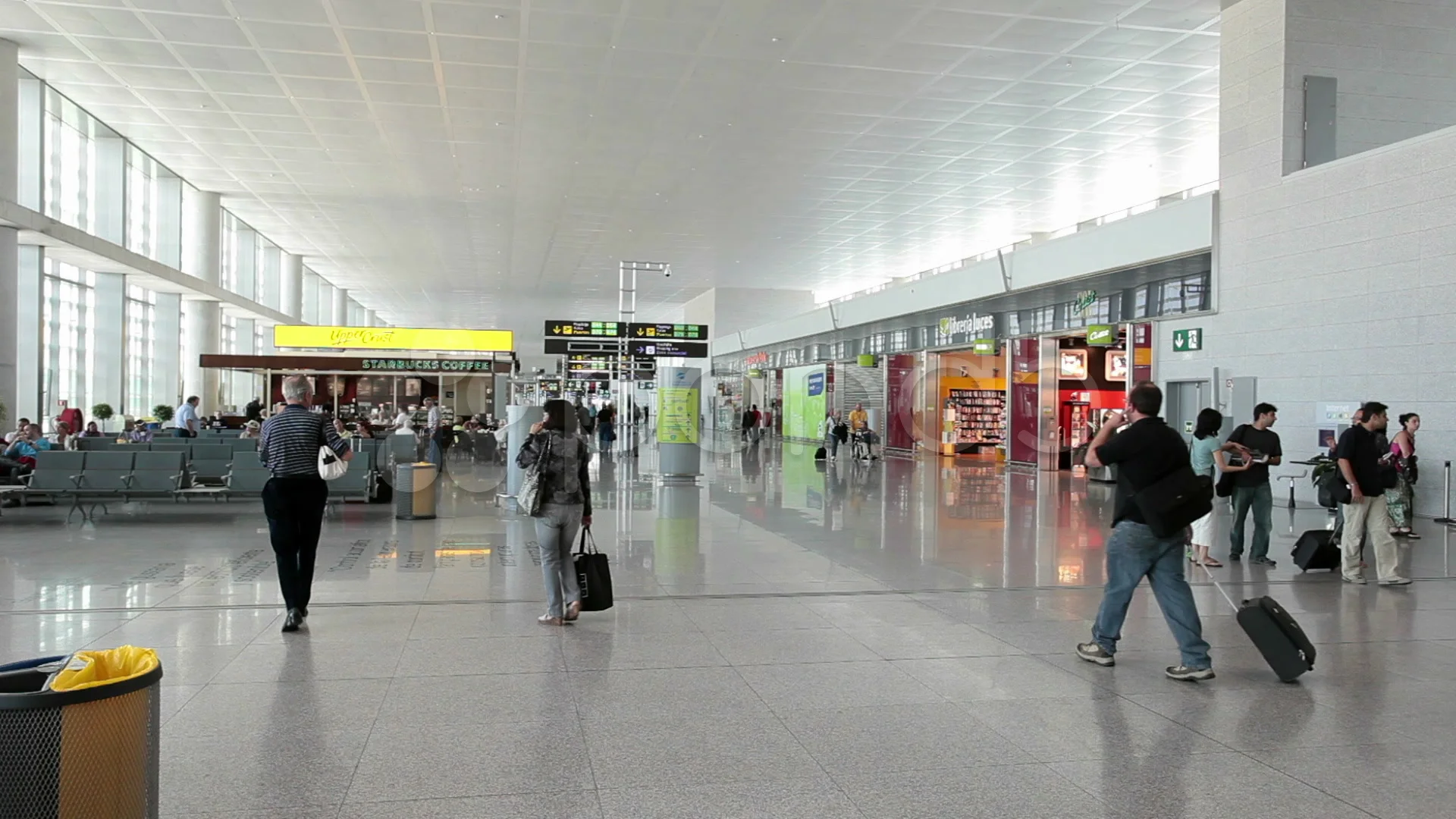 Malaga Airport passengers walking in ter... | Stock Video | Pond5