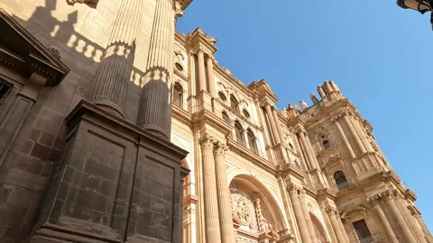 Malaga cathedral from bottom in evening, sun shining. Video stock 220618526