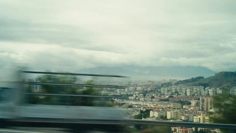 Malaga cityscape with mountains under cloudy sky Stock-Footage 329466474