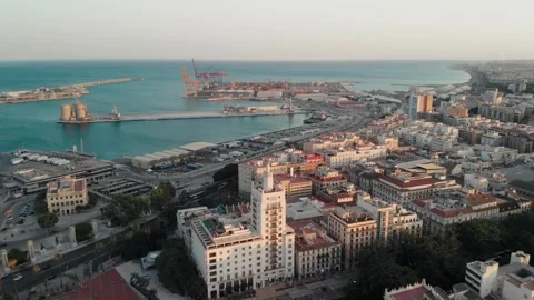 Malaga cityscape unfolding with vibrant harbor life and expansive mediterra.. Stock Footage 341828699