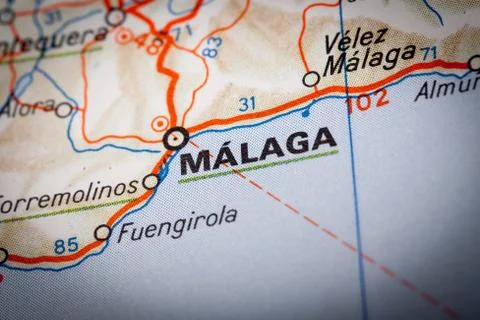 Malaga on a road map Stock Photos