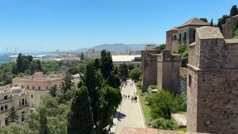 Malaga, Spain - 05 20 2025: Exploring Malaga streets Stock Footage 320476708