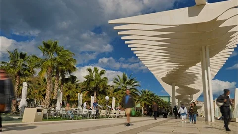 Malaga, Spain. Circa March 2018. Timelapse of people in "Palmeral de las 스톡 동영상 89862289