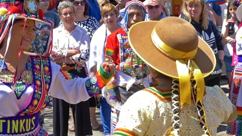 Malaga, Spain. Circa May 2018. Bolivian Caporals and tinku folk dancing group of Stockbeeldmateriaal 89607749