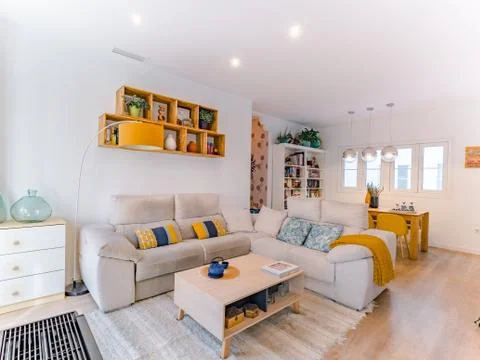 Malaga, Spain. Circa October 2019. Cozy stylish bright living room with natur Stock Photos