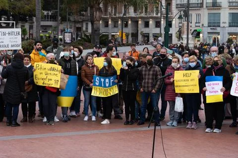 Malaga Spain February 27 2022: Demonstrators against the invasion of Ukraine. Stock Photos
