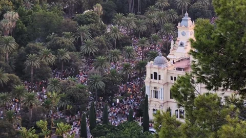 MALAGA, SPAIN - SEPTEMBER 2, 2026: People gather in a park near Malaga City.. Stock Footage 344584206