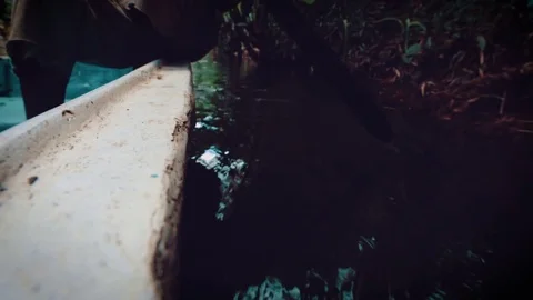 Malagasy Man Rowing Canoe 02 Stock Footage