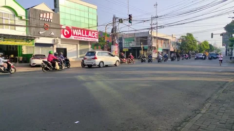 Malang City Intersection: Rush Hour Traffic Stock Footage 312183729
