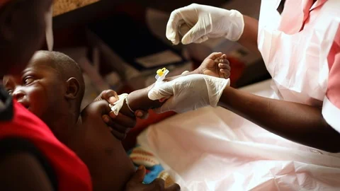 Malaria testing and treatment in Uganda, Africa Stock Footage 106310035