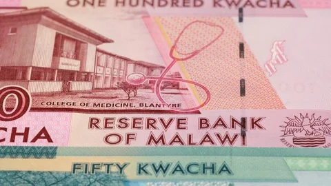 Malawi kwacha notes fast tracking. Malawian money. Slider shot, low angle. 4K Stock Footage 126005949