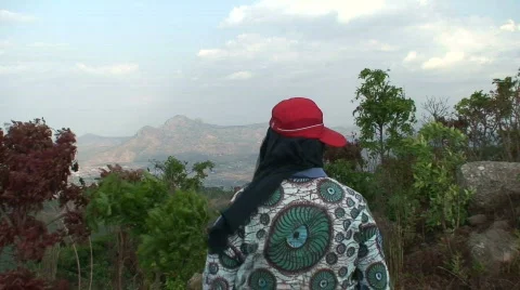Malawi: man watching mountains Stock Footage 289748