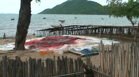 Malawi: nets drying in backyard Stock Footage 732344