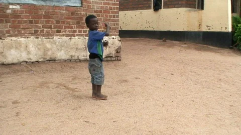 Malawi: poor african boy with a fish 1 Stock Footage 362128