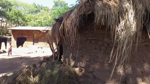 Malawi Village Life Typical mud thatched house