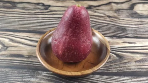Malay Apple on Wooden Table Stock Footage 299128684