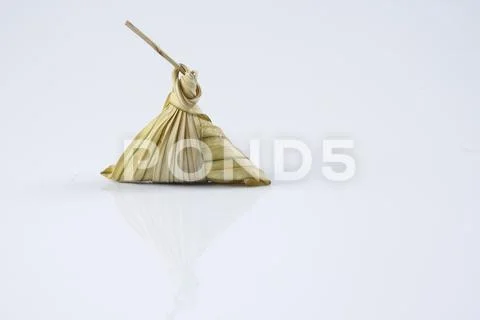 Malay dish ketupat daun palas or rice dumpling where glutinous rice is wrappe Stock Photos